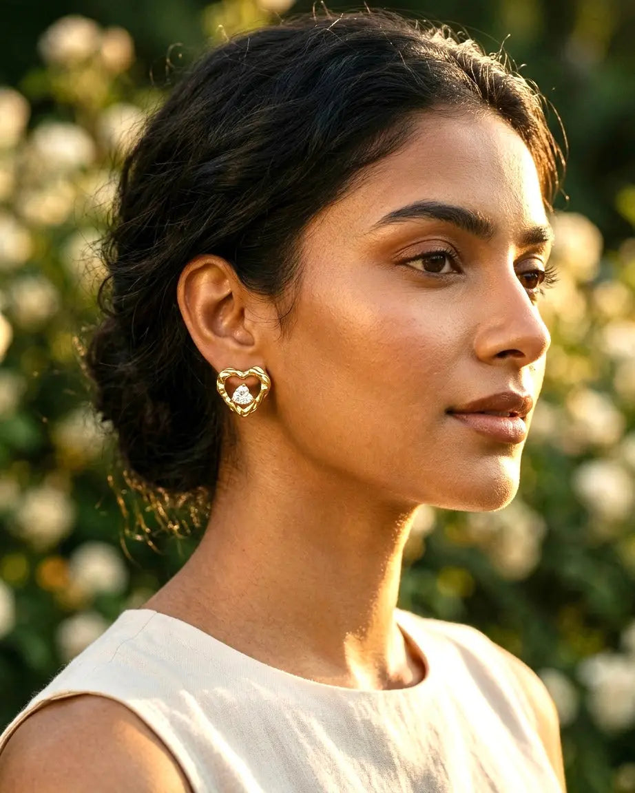 Golden Heart Glow Stud Earrings